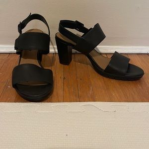 Clark’s heeled black sandals